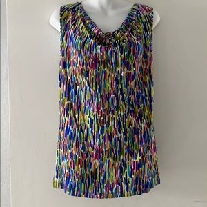 A scoop neck blouse/shirt